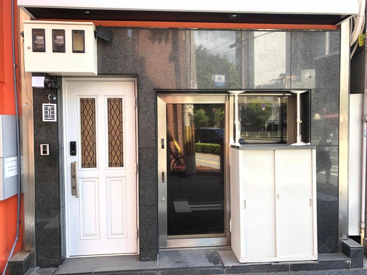 Hotel Orange House Osaka Bagian luar foto